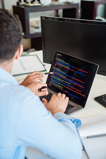 A computer screen displaying a close-up of HTML and CSS code in a dark-themed code editor. The code includes tags, class attributes, and image file references with yellow, blue, red, and white syntax 